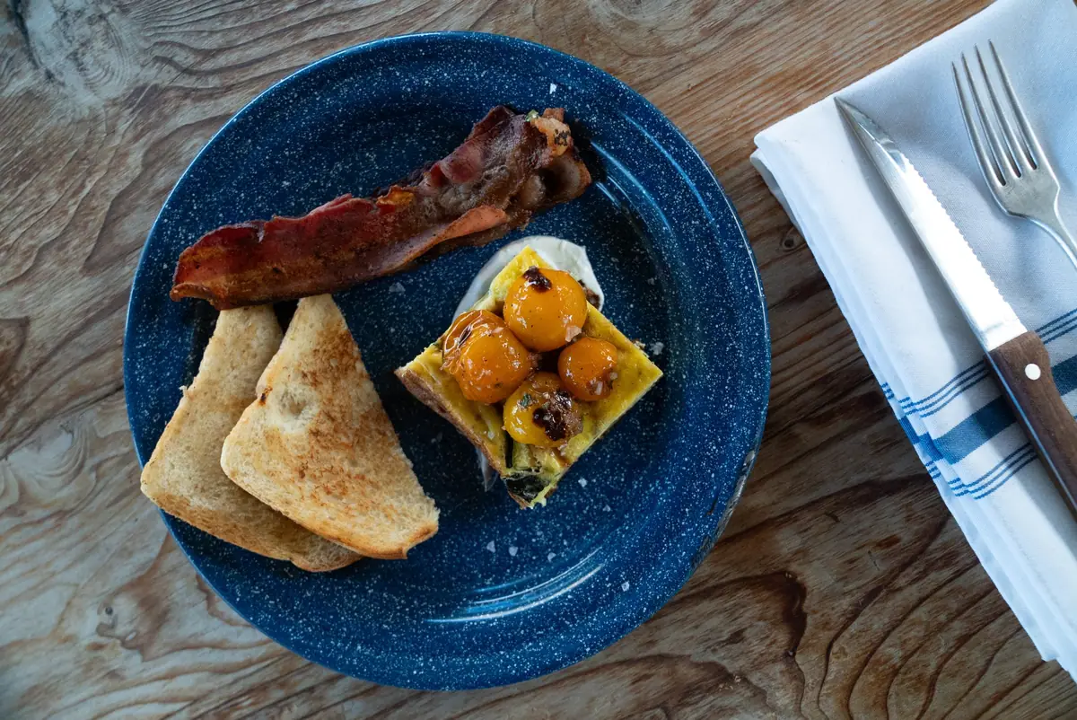 Breakfast at camp on an enamel plate