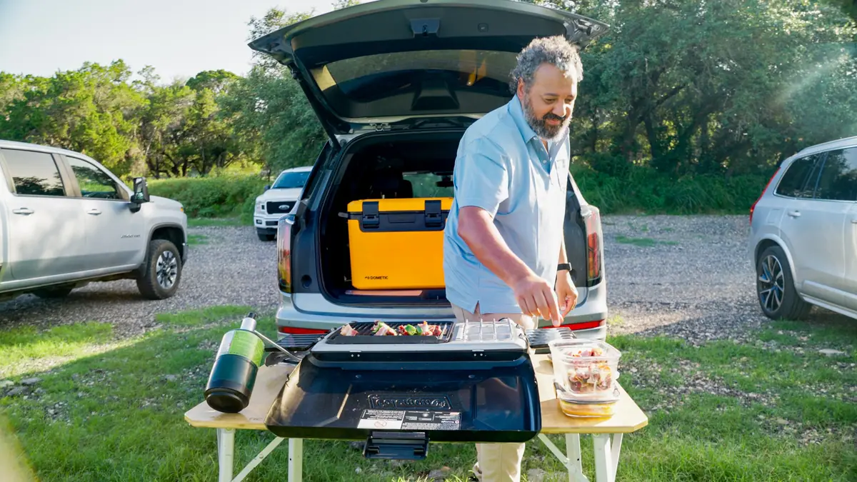 Josh Crumpton cooking at a tailgate during a field shoot