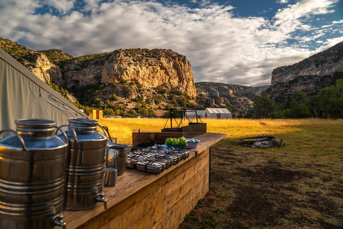 The camp kitchen at Paintrock Canyon Ranch, Wyoming, with the canyon walls behind